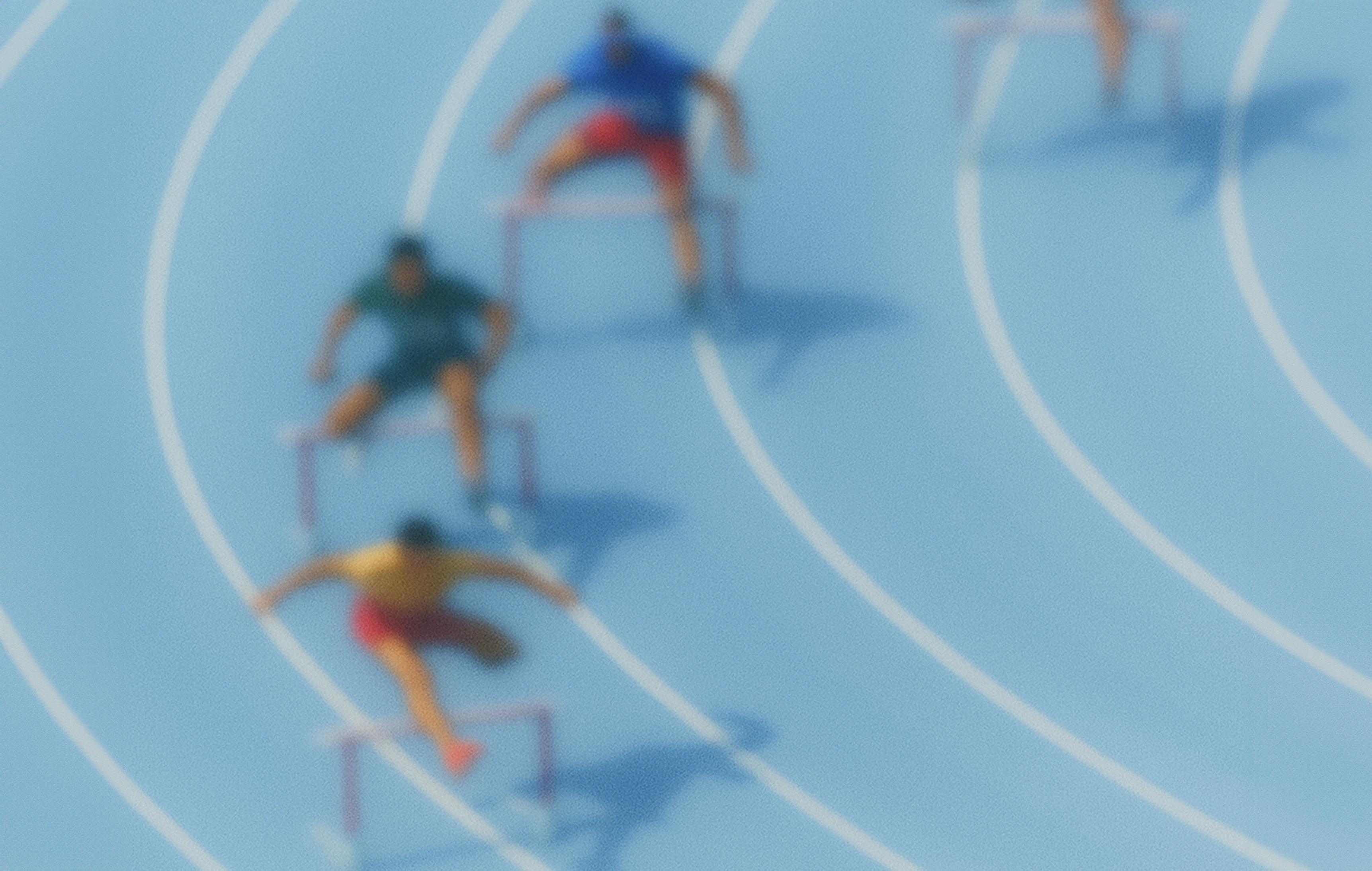 Athletes running on a track